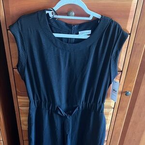 Black Calvin Klein one piece jumpsuit, NWT, zips in back, ties at waist